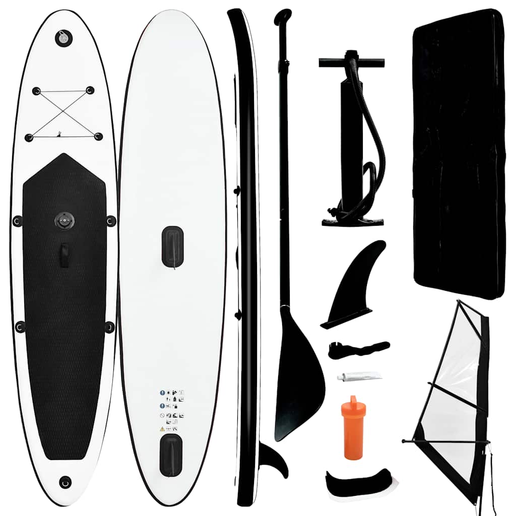 oppusteligt paddleboard med sejl sort og hvid billede