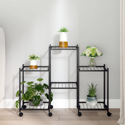 blomsterstativ med hjul 83x25x63,5 cm jern sort