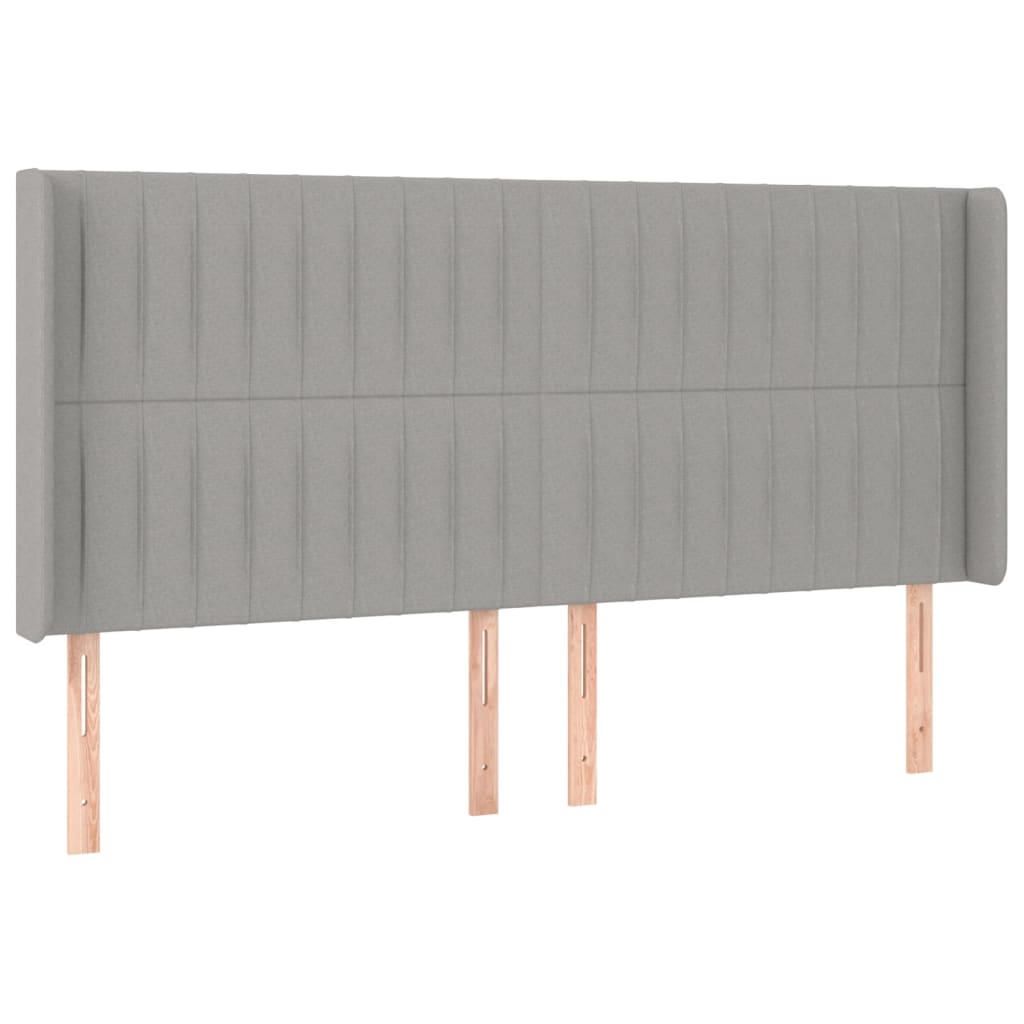 sengegavl med kanter 163x16x118/128 cm stof lysegrå