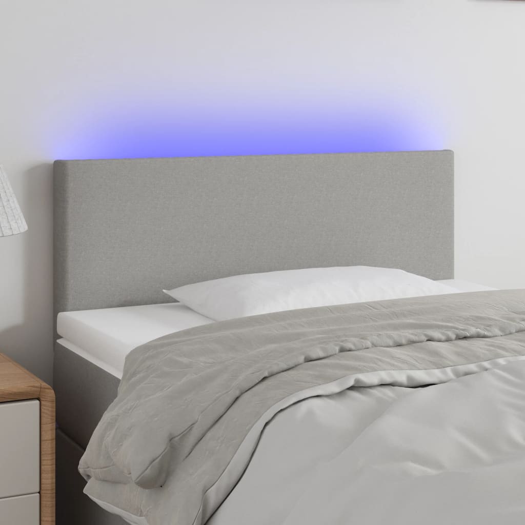 sengegavl med LED-lys 80x5x78/88 cm stof lysegrå