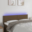 sengegavl med LED-lys 144x5x78/88 cm stof mørkebrun