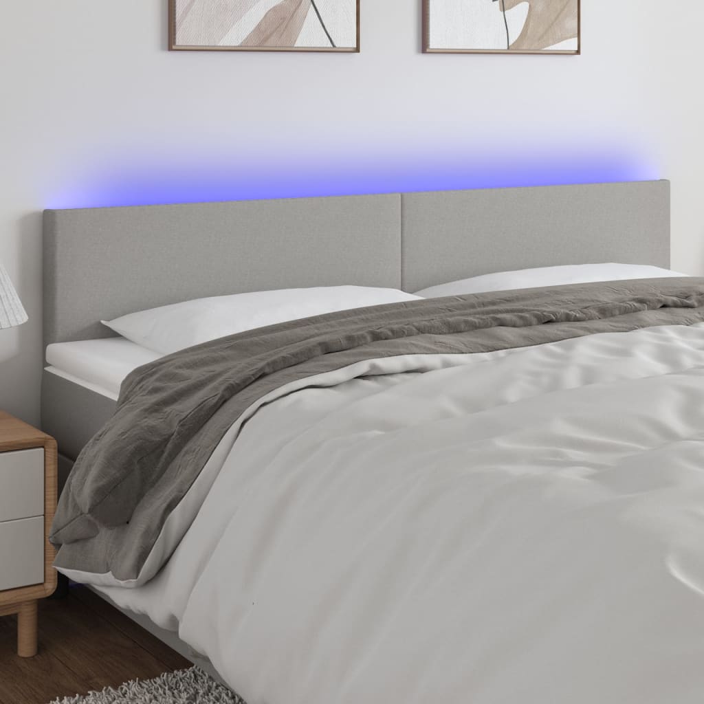 sengegavl med LED-lys 160x5x78/88 cm stof lysegrå