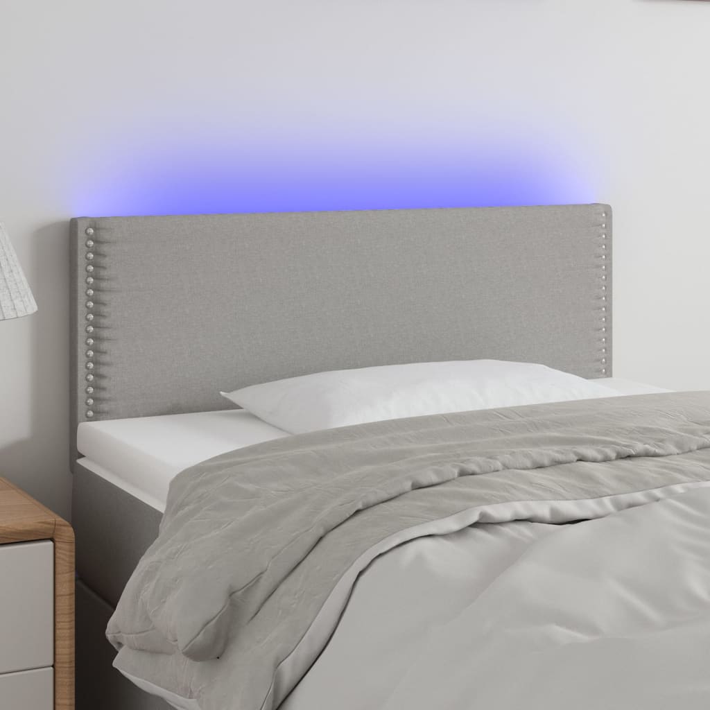 sengegavl med LED-lys 100x5x78/88 cm stof lysegrå