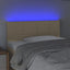 sengegavl med LED-lys 90x5x78/88 cm stof cremefarvet