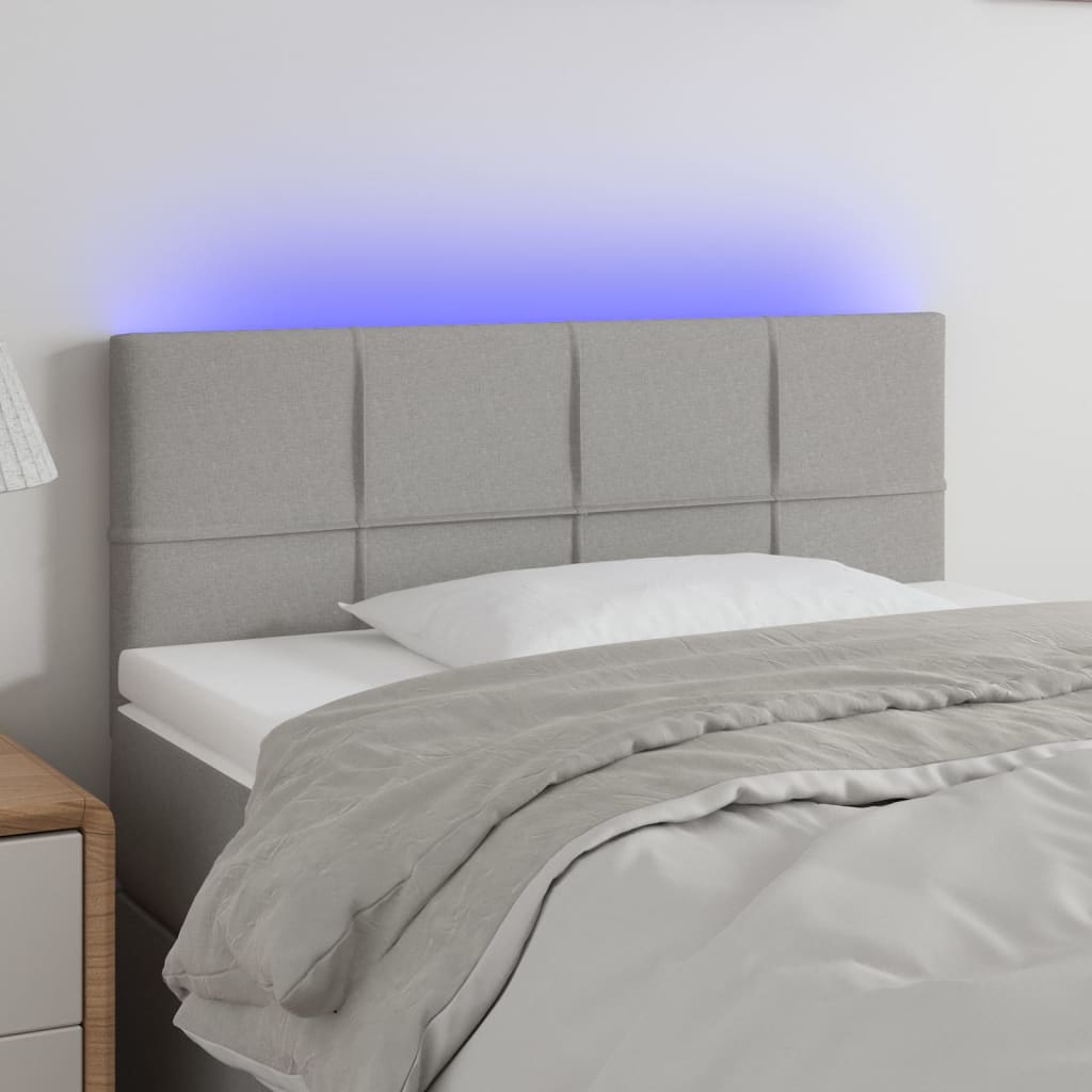sengegavl med LED-lys 100x5x78/88 cm stof lysegrå