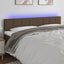 sengegavl med LED-lys 200x5x78/88 cm stof gråbrun