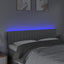 sengegavl med LED-lys 144x5x78/88 cm stof lysegrå