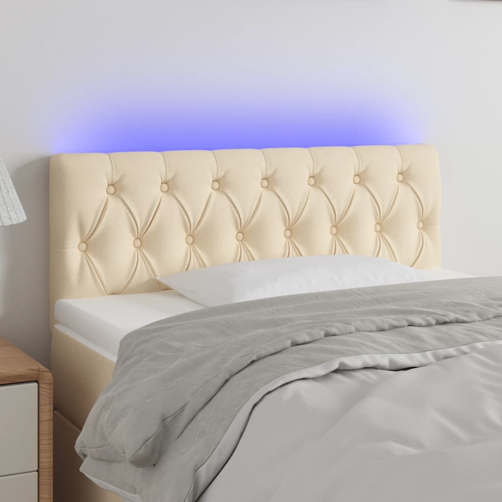 sengegavl med LED-lys 100x7x78/88 cm stof cremefarvet