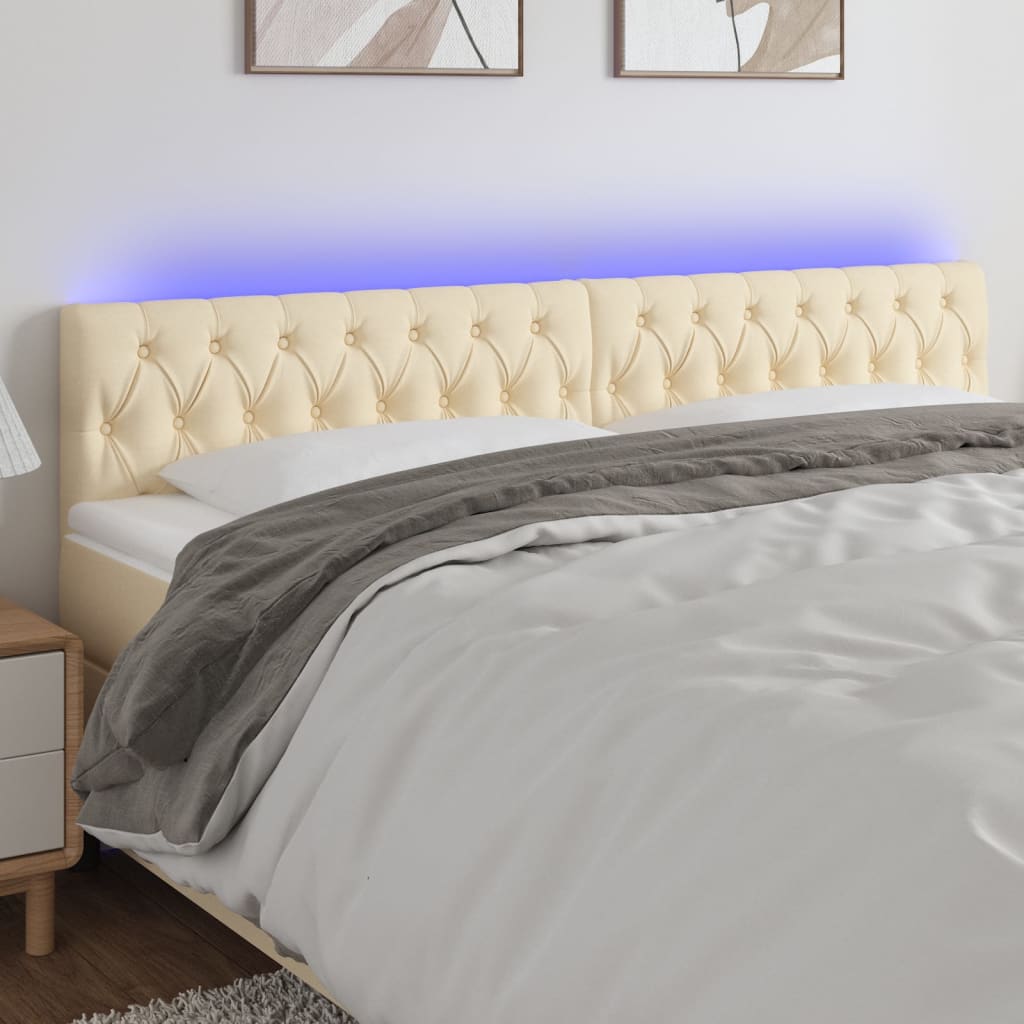 sengegavl med LED-lys 200x7x78/88 cm stof cremefarvet
