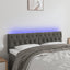 sengegavl med LED-lys 160x7x78/88 cm velour mørkegrå