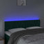 sengegavl med LED-lys 160x7x78/88 cm velour mørkegrøn