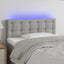sengegavl med LED-lys 100x5x78/88 cm stof lysegrå