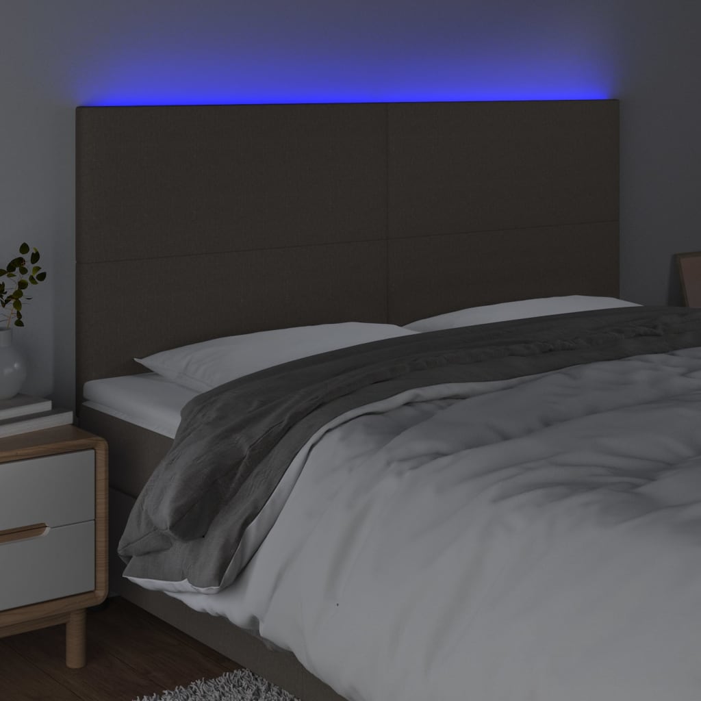 sengegavl med LED-lys 160x5x118/128 cm stof gråbrun