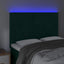sengegavl med LED-lys 144x5x118/128 cm fløjl mørkegrøn