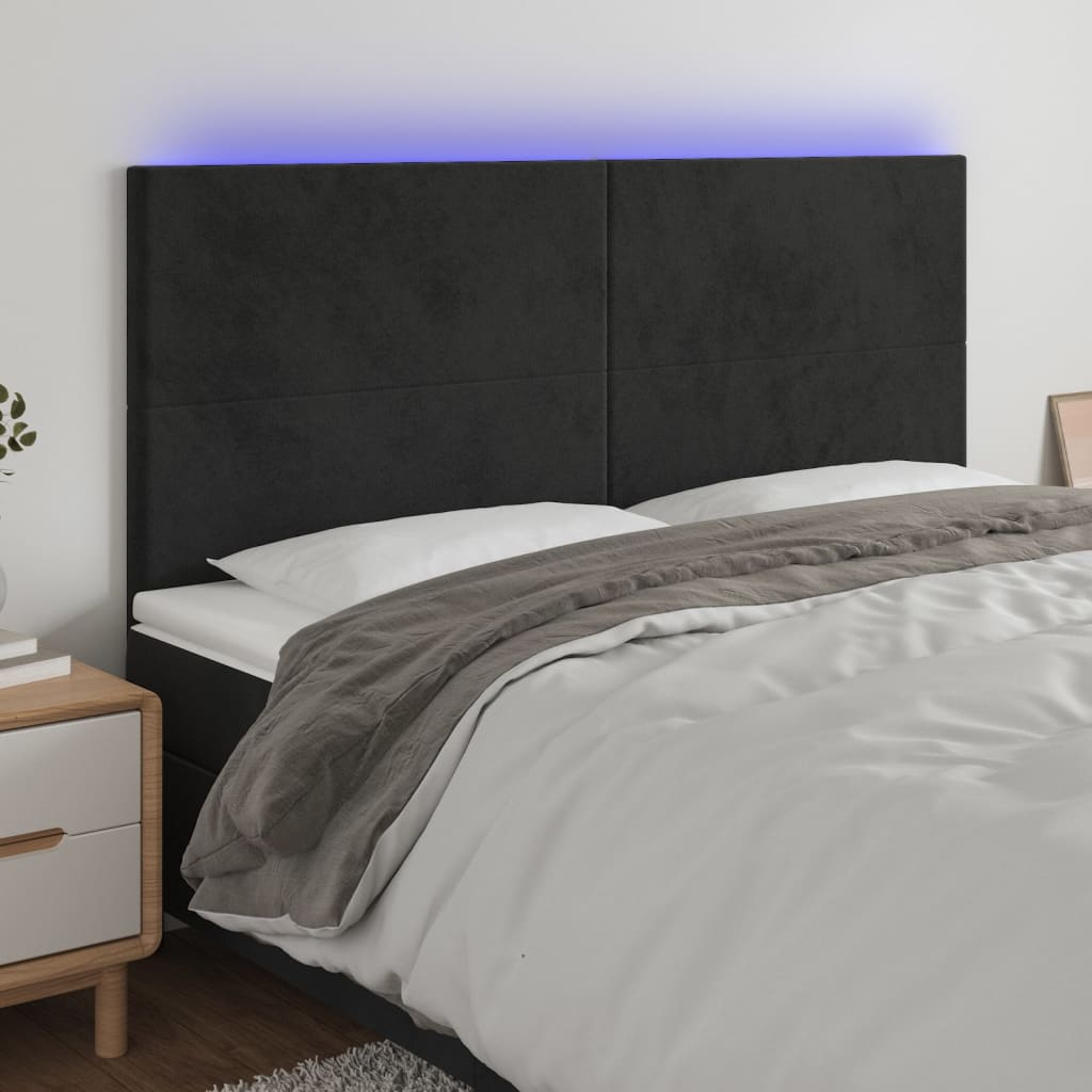 sengegavl med LED-lys 180x5x118/128 cm fløjl sort