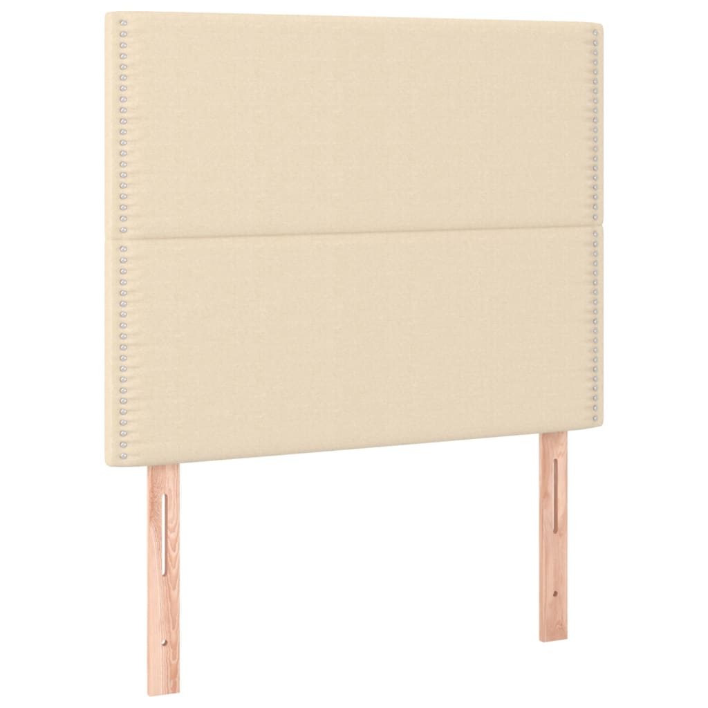 sengegavl med LED-lys 90x5x118/128 cm stof cremefarvet