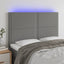 sengegavl med LED-lys 144x5x118/128 cm stof mørkegrå