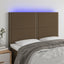 sengegavl med LED-lys 144x5x118/128 cm stof mørkebrun