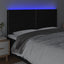 sengegavl med LED-lys 200x5x118/128 cm stof sort