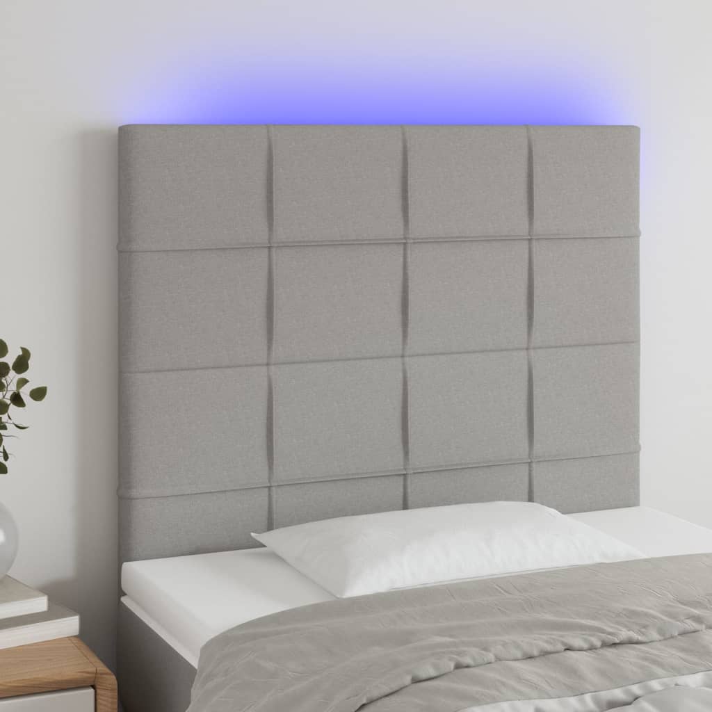 sengegavl med LED-lys 90x5x118/128 cm stof lysegrå