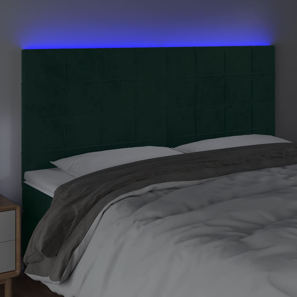 sengegavl med LED-lys 160x5x118/128 cm fløjl mørkegrøn