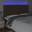 sengegavl med LED-lys 160x5x118/128 cm stof mørkebrun