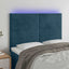 sengegavl med LED-lys 144x5x118/128 cm fløjl mørkeblå