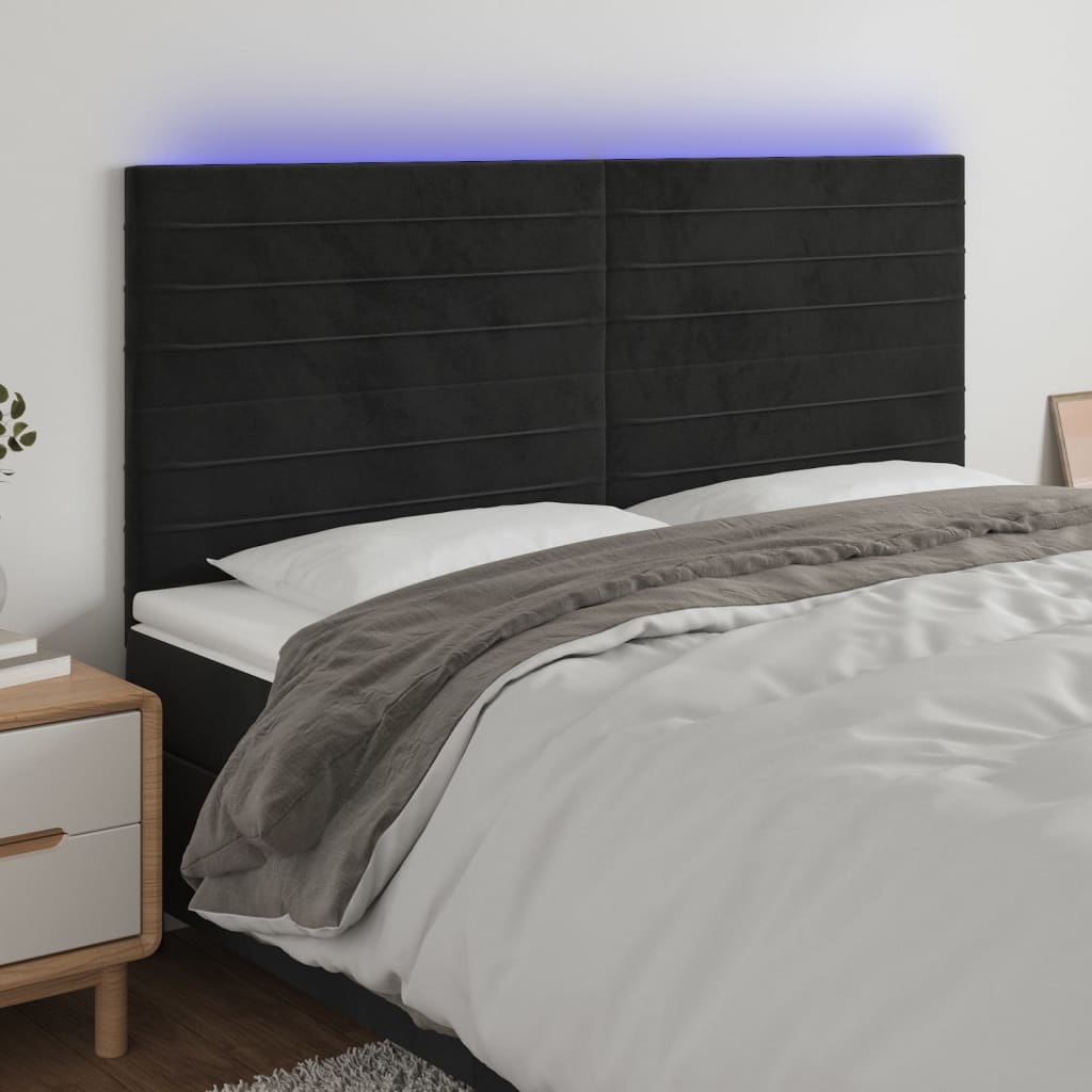 sengegavl med LED-lys 180x5x118/128 cm fløjl sort
