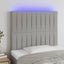 sengegavl med LED-lys 100x5x118/128 cm stof lysegrå