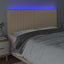 sengegavl med LED-lys 180x5x118/128 cm stof cremefarvet