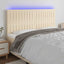 sengegavl med LED-lys 180x5x118/128 cm stof cremefarvet