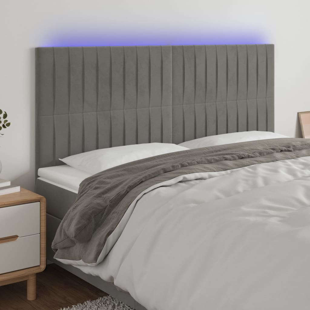 sengegavl med LED-lys 160x5x118/128 cm fløjl lysegrå
