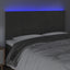 sengegavl med LED-lys 200x5x118/128 cm fløjl mørkegrå