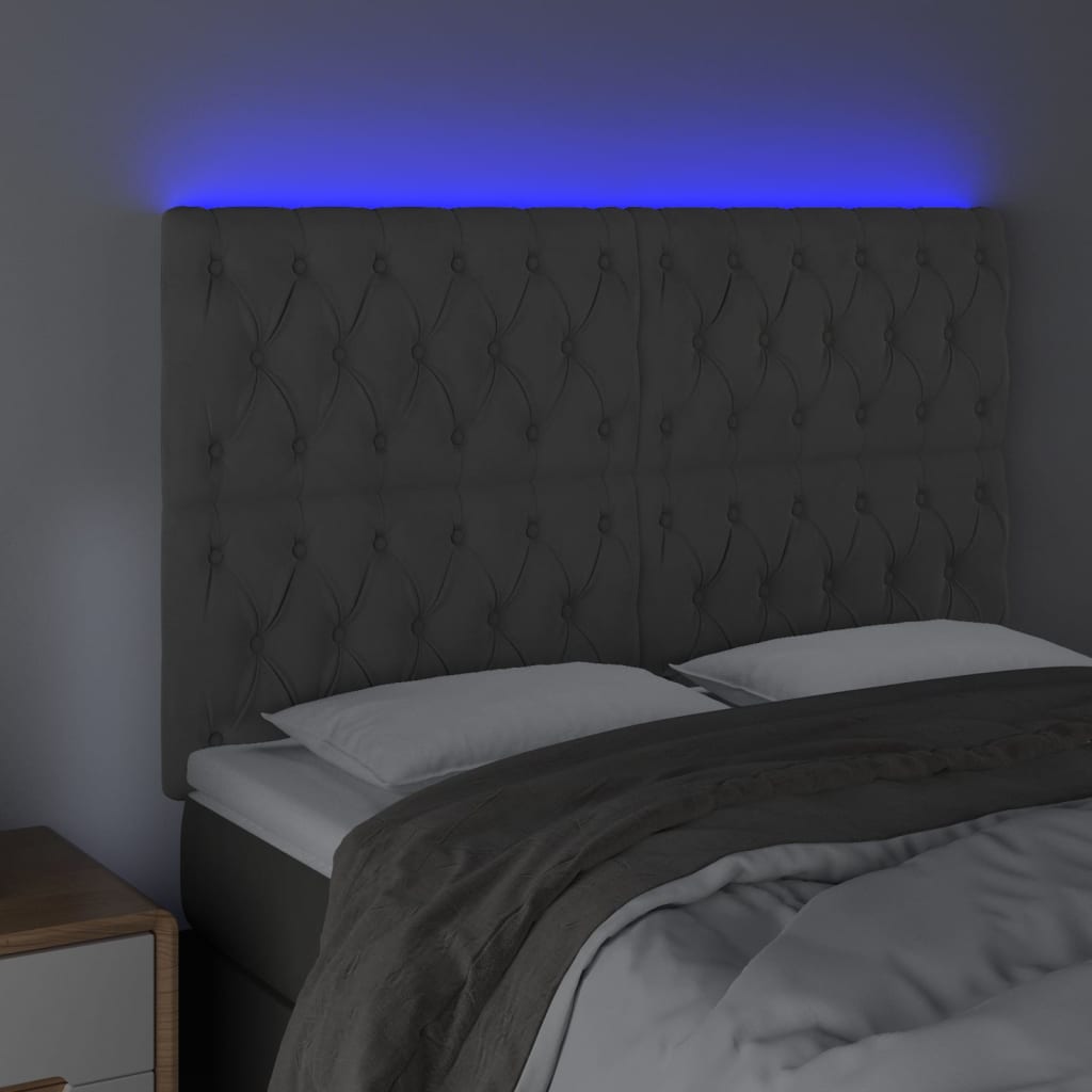 sengegavl med LED-lys 144x7x118/128 cm fløjl mørkegrå