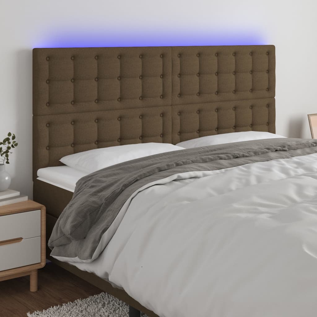 sengegavl med LED-lys 180x5x118/128 cm stof mørkebrun