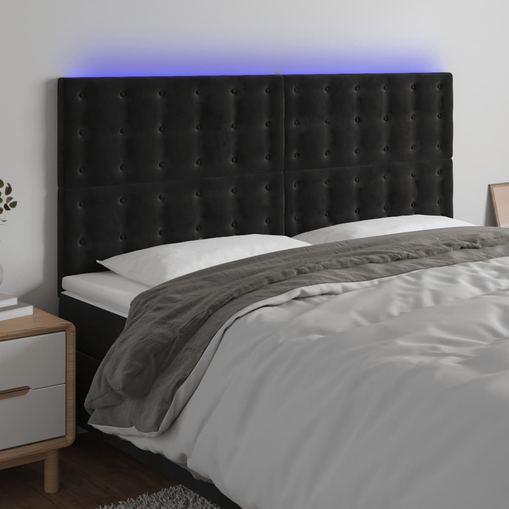 sengegavl med LED-lys 200x5x118/128 cm fløjl sort