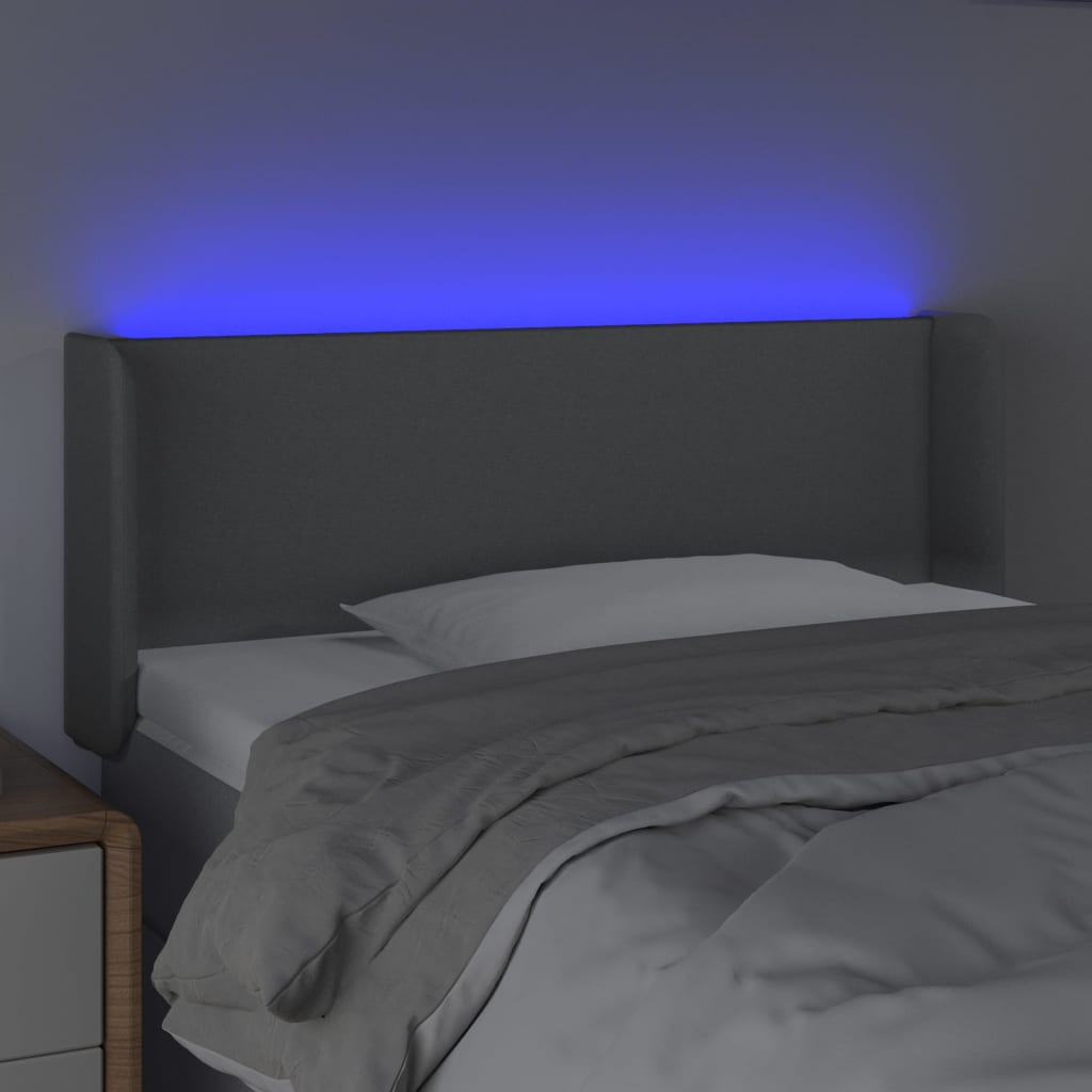 sengegavl med LED-lys 83x16x78/88 cm stof lysegrå