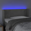 sengegavl med LED-lys 83x16x78/88 cm fløjl lysegrå