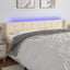 sengegavl med LED-lys 163x16x78/88 cm stof cremefarvet