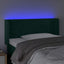 sengegavl med LED-lys 83x16x78/88 cm fløjl Mørkegrøn