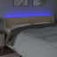 sengegavl med LED-lys 183x16x78/88 cm stof cremefarvet