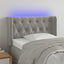 sengegavl med LED-lys 83x16x78/88 cm fløjl lysegrå