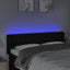 sengegavl med LED-lys 147x16x78/88 cm stof sort