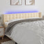 sengegavl med LED-lys 163x16x78/88 cm stof cremefarvet