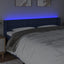 sengegavl med LED-lys 163x16x78/88 cm stof blå