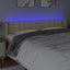 sengegavl med LED-lys 183x16x78/88 cm stof cremefarvet