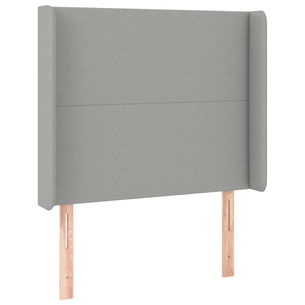 sengegavl med LED-lys 83x16x118/128 cm stof lysegrå