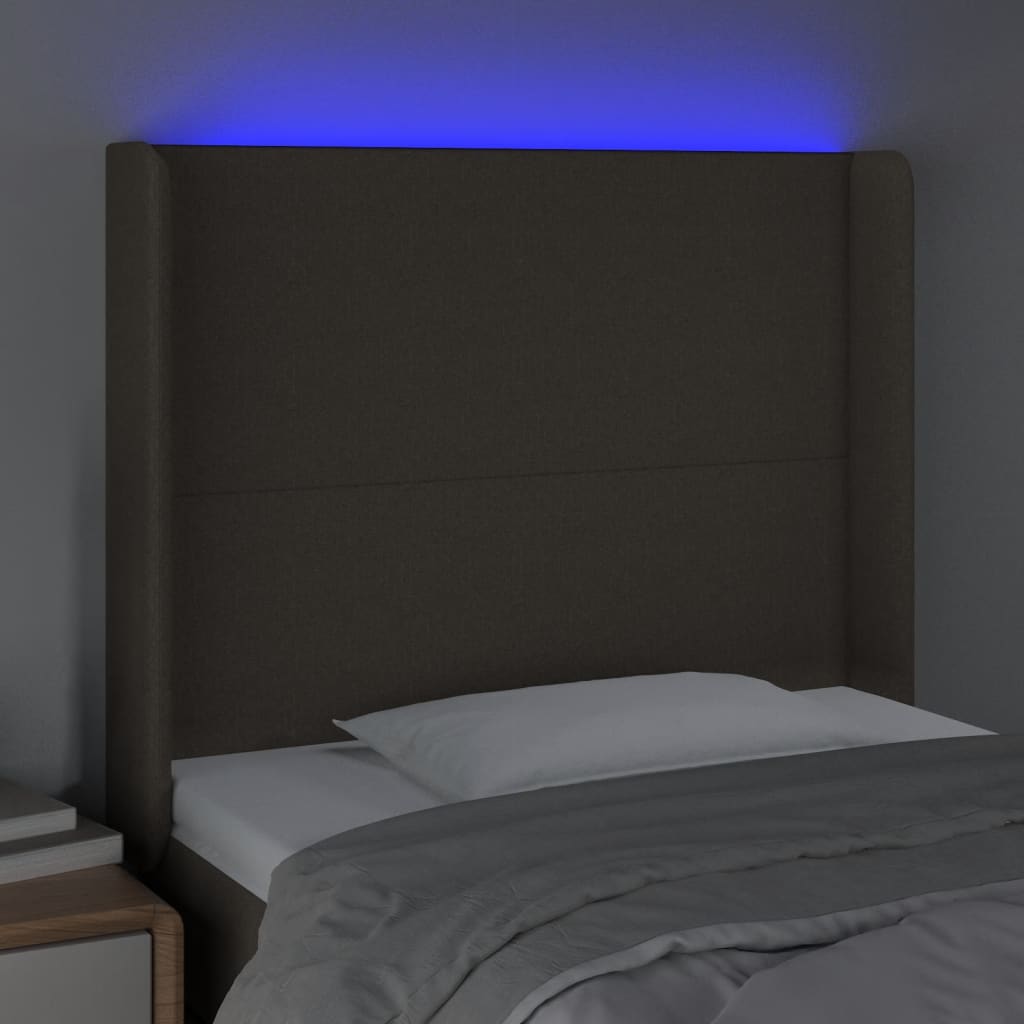sengegavl med LED-lys 83x16x118/128 cm stof gråbrun