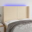 sengegavl med LED-lys 147x16x118/128 cm stof cremefarvet
