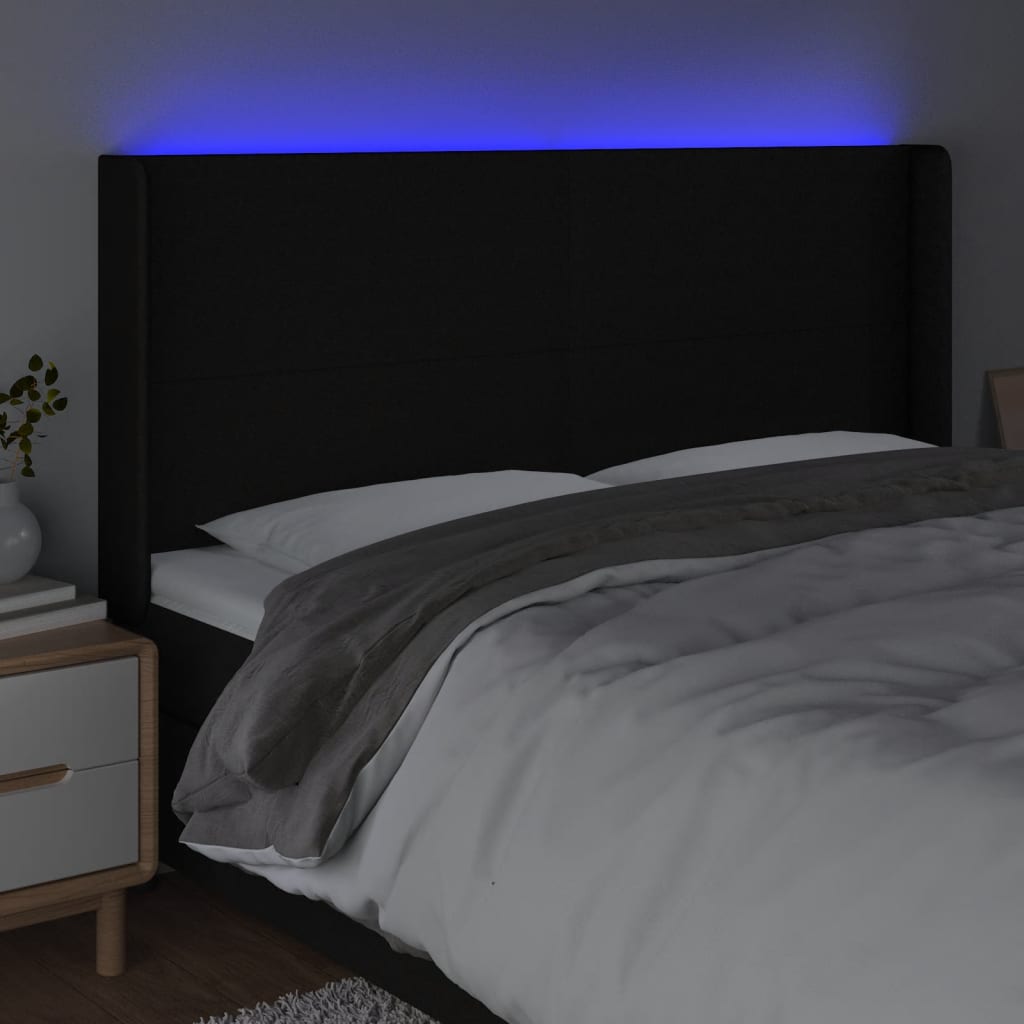 sengegavl med LED-lys 163x16x118/128 cm stof sort